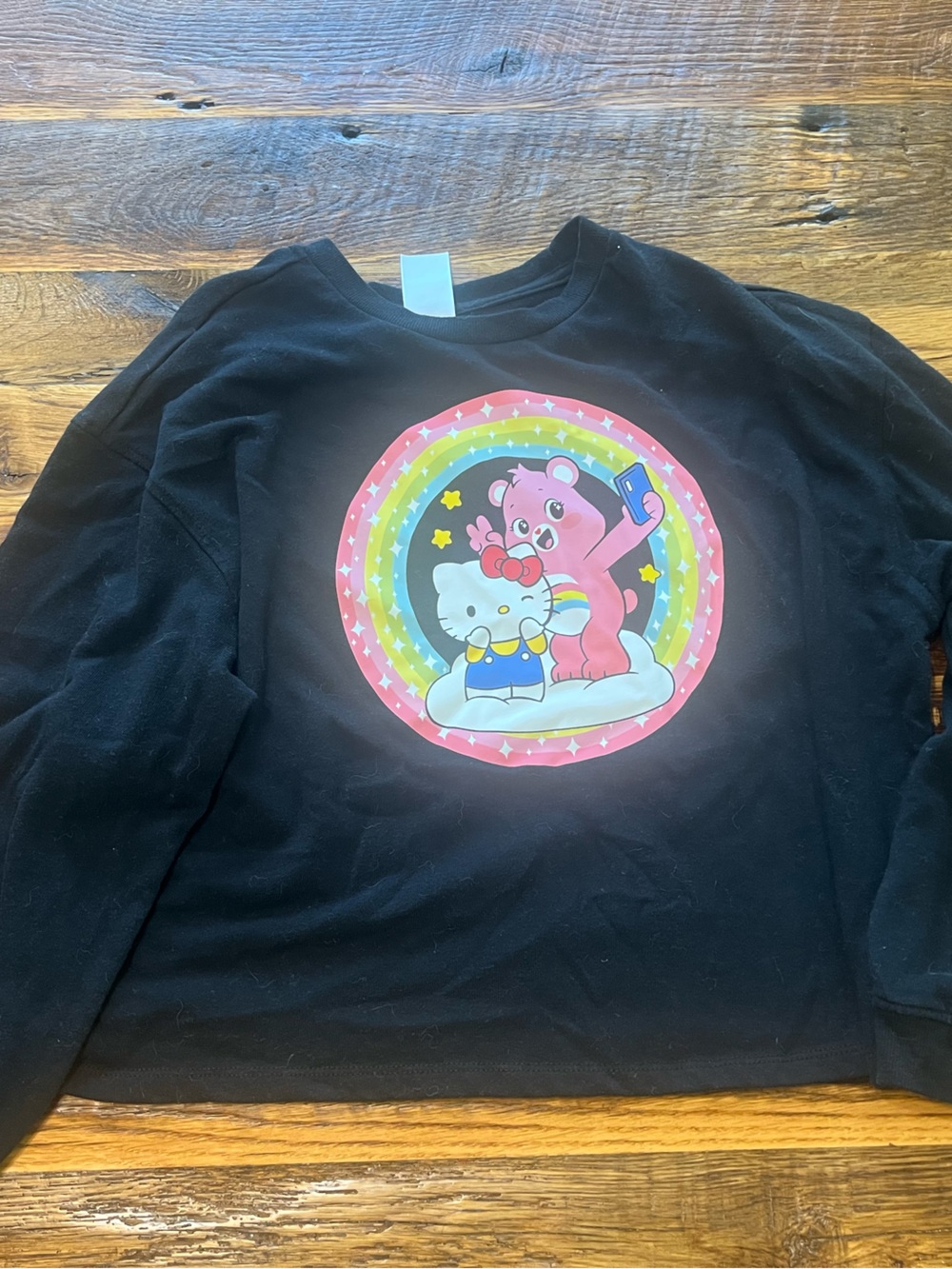 Sanrio Black Sweatshirt with Pink Rainbow Character Graphic